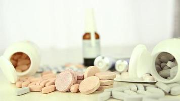 Medicine box, many different spinning drugs, tablet, medical pill, selective focus, noise effect video