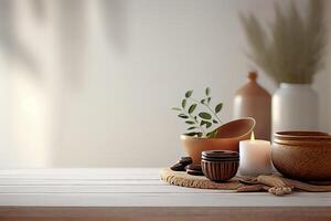 Spa stones, towel and candles on color background. Spa composition and treatments on light wooden background, close-up. photo