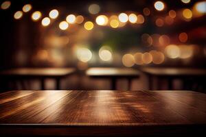 image of wooden table in front of abstract blurred background of resturant lights. Wood table top on blur of lighting in night cafe,restaurant background. selective focus. photo