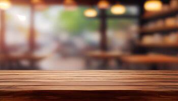 image of wooden table in front of abstract blurred background of resturant lights. Wood table top on blur of lighting in night cafe,restaurant background. selective focus. photo