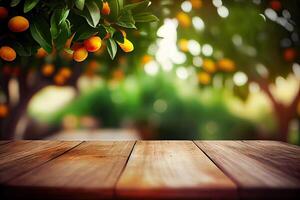 Empty wood table with free space over orange trees, orange field background. For product display montage. wooden table place of free space for your. photo