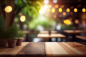 image of wooden table in front of abstract blurred background of resturant lights. Wood table top on blur of lighting in night cafe,restaurant background. selective focus. photo