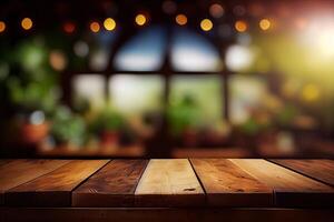 image of wooden table in front of abstract blurred background of resturant lights. Wood table top on blur of lighting in night cafe,restaurant background. selective focus. photo