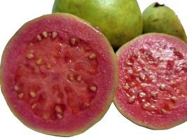 Guava fruit, pink, fresh, isolated on white background. Front view. photo
