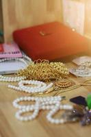 Thai jewelry golden belt and Pearl necklace in tradition Thai wedding ceremony photo