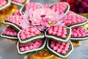 Beautiful flowers decoration on Engagement gold bowl for Thai engagement ceremony.Thai wedding culture tradition photo