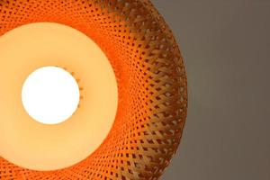 Rattan lamp hanging on ceiling.Interior and lighting design photo