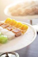 Delicious Thai sweet dessert decoration on table in wedding ceremony. photo