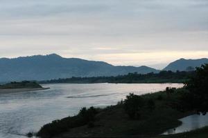 Beautiful landscape of Mountain and nature in sunrise near MeKhong river the Thai-Laos border Chaingkhong distric Thailand photo