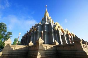 Golden pagoda in temple located on the mountain and very beautiful view in Chiangrai Province, Thailand. photo