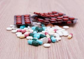 colorful pills with capsules and pills put on the hospital pharmacy dispensing table Pharmacies and clinics' health care photo