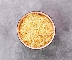 Instant noodles or ramen food Thai Japanese Chinese tasty food in a white bowl on the table-top view photo