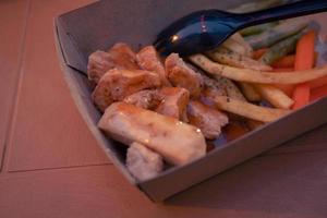 Fried chicken steak with fired fries bean and barbeque black paper sauce. The photo is suitable to use for food background, poster and food content media.