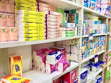 tissue, A row of display cases for cleaning products, with the brand 'Nice, Tessa, Jolly' on a shelf in a supermarket, suitable for editorial needs, Batam, Indonesia-April 2023 photo