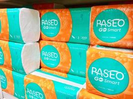 paseo tissue, A row of display cases for cleaning products, with the brand 'Paseo' on a shelf in a supermarket, suitable for editorial needs, Batam, Indonesia-April 2023 photo