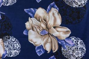 Smooth Gold metallic flower panel fabric ,blue background photo