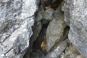 The entrance to the karst cave. Background photo