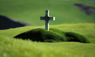 cross in morning green field. Christian cross of Jesus Christ on a field. . photo