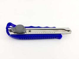 razor blade, a blue razor blade on a plain white background, suitable for commercial product photography needs photo