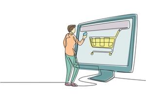 Continuous one line drawing young man shopping online via giant computer screen with shopping cart inside. Digital lifestyle, consumerism concept. Single line draw design vector graphic illustration