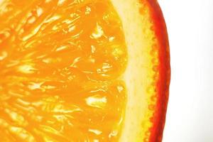 orange slice macro. juicy orange sliced closeup photo