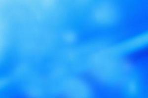 abstract light blue blurred shine background with gradient photo