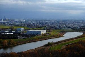 Scenery of Sapporo from a Mountain in Moerenuma Park in the Autumn. photo