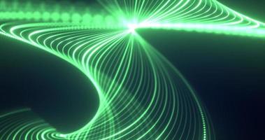 Abstract green waves from lines and dots particles of glowing swirling futuristic hi-tech with blur effect on dark background. Abstract background photo