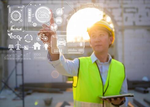 Close up engineering man hand is touching virtual reality Analytics engineering data in a field over construction background photo