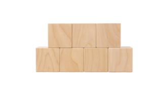 Seven wooden cubes stacked in the form of a pyramid. transparent isolated background. Copy space. png