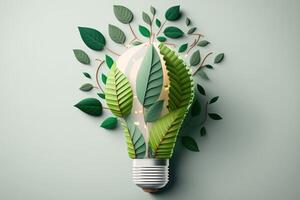 Paper cut of eco friendly light bulb with green leaves, Renewable and sustainable energy concept. photo