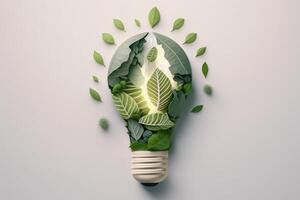 Paper cut of eco friendly light bulb with green leaves, Renewable and sustainable energy concept. photo