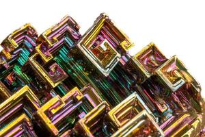 Macro of the mineral bismuth stone on a white background photo