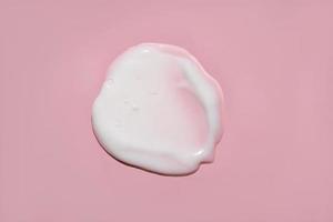 blanco crema con burbujas muestra de tela en rosado antecedentes foto