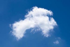 Abstract white cloud in blue sky isolated photo