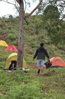 Gorontalo, 5 Feb 2023 - A group of people camping together in nature photo