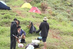 Gorontalo, 5 Feb 2023 - A group of people camping together in nature photo