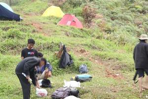 Gorontalo, 5 Feb 2023 - A group of people camping together in nature photo