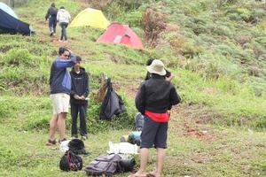 Gorontalo, 5 Feb 2023 - A group of people camping together in nature photo