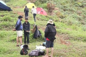 Gorontalo, 5 Feb 2023 - A group of people camping together in nature photo