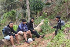 Gorontalo, 5 Feb 2023 - A group of people camping together in nature photo