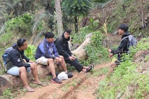 Gorontalo, 5 Feb 2023 - A group of people camping together in nature photo
