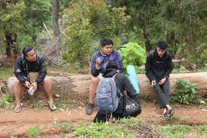 Gorontalo, 5 Feb 2023 - A group of people camping together in nature photo