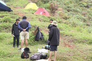 Gorontalo, 5 Feb 2023 - A group of people camping together in nature photo
