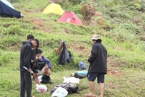 Gorontalo, 5 Feb 2023 - A group of people camping together in nature photo