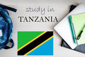 Study in Tanzania. Background with notepad, laptop and backpack. Education concept. photo