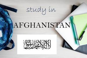 Study in Afghanistan. Background with notepad, laptop and backpack. Education concept. photo
