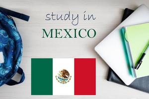 Study in Mexico. Background with notepad, laptop and backpack. Education concept. photo