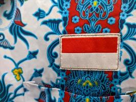 Surabaya, indonesia - april, 2023 - A close up of Indonesian flag logo on batik uniform photo