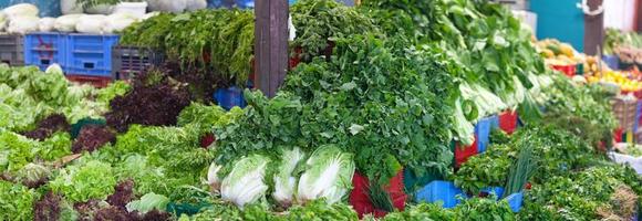 Salads stand in a market on Reunion Island photo